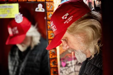 Jesper Toennesen - the creator of the Anti-MAGA cap "Nu det NUUK!" poses while wearing one in his clothing store McKorman on Noerrebrogade in Copenhagen, on January 13, 2026. The message "Nu er det NUUK!" and "Make America go away" is embroidered on the cap. After the heated debate between the US, Greenland, and Denmark about Trump's renewed desire to take over Greenland, "Nu er det NUUK" has gone viral on the internet. The phrase "Nu er det NUUK!" refers to Greenland's capital Nuuk - and can be translated from Danish as "Enough is enough". (Photo by Thomas Traasdahl/Ritzau Scanpix/AFP)/Denmark OUT