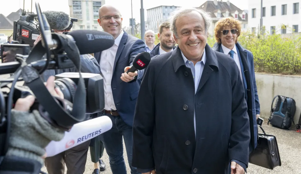epa11986608 Former UEFA President, Michel Platini (C) arrives to the hear the trial verdict at the special appeals court in Muttenz, Switzerland, 25 March 2025. A special appeals court, sitting in Muttenz near Basel, will hear request by Switzerland's Attorney General's office (OAG) to reopen proceedings against Joseph (Sepp) Blatter and Michel Platini. EPA/URS FLUEELER