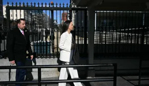 Venezuelan opposition leader Maria Corina Machado arrives at a security gate at the White House ahead of a meeting with US President Donald Trump, in Washington, DC on January 15, 2026. (Photo by Brendan SMIALOWSKI/AFP)