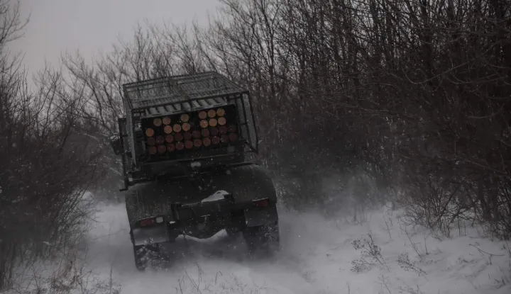 This handout photograph taken on January 15, 2026, and released on January 16, 2026, by the Press Service of the 24th Mechanized Brigade of Ukrainian Armed Forces shows Ukrainian servicemen riding a Bm-21 Grad MRLS to fire towards Russian positions near Chasiv Yar in the Donetsk region, amid the Russian invasion of Ukraine. (Photo by OLEG PETRASIUK/24th Mechanized Brigade of Ukrainian Armed Forces/AFP)/RESTRICTED TO EDITORIAL USE - MANDATORY CREDIT "AFP PHOTO/HANDOUT/ OLEG PETRASIUK/24th Mechanized Brigade of Ukrainian Armed Forces" - NO MARKETING NO ADVERTISING CAMPAIGNS - DISTRIBUTED AS A SERVICE TO CLIENTS