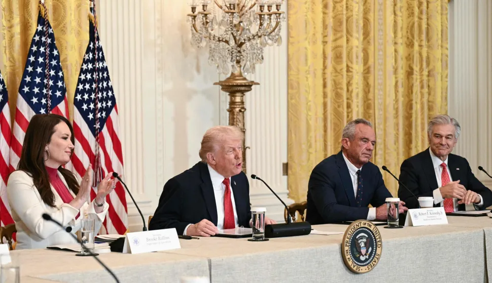 US President Donald Trump speaks alongside (L/R) Secretary of Agriculture Brooke Rollins, Secretary of Health and Human Services Robert F. Kennedy Jr. and Medicare and Medicaid Administrator Mehmet Oz during a roundtable discussion on rural health care investments in the East Room of the White House in Washington, DC on January 16, 2026. (Photo by Brendan SMIALOWSKI/AFP)