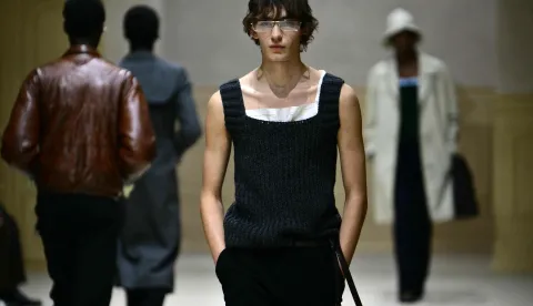 A model walks the runway during the Prada collection show as part of Men's Fall/Winter 2026-2027 Milan's fashion week, on January 18, 2026. (Photo by Stefano RELLANDINI/AFP)