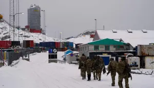 Danish soldiers disembark at the port in Nuuk, Greenland, on January 18, 2026. The Danish Defense will continue the increased presence with exercise activities together with a number of NATO allies in and around Greenland in 2026. This is done in cooperation with the Greenlandic authorities and the Greenlandic government, Naalakkersuisut, as stated by the Danish Defense. (Photo by Mads Claus Rasmussen/Ritzau Scanpix/AFP)/Denmark OUT