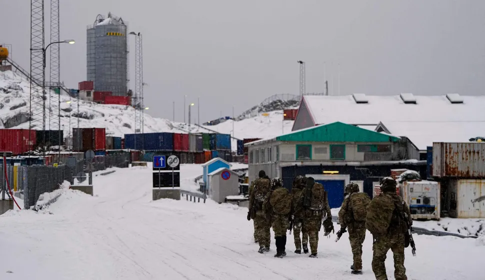 Danish soldiers disembark at the port in Nuuk, Greenland, on January 18, 2026. The Danish Defense will continue the increased presence with exercise activities together with a number of NATO allies in and around Greenland in 2026. This is done in cooperation with the Greenlandic authorities and the Greenlandic government, Naalakkersuisut, as stated by the Danish Defense. (Photo by Mads Claus Rasmussen/Ritzau Scanpix/AFP)/Denmark OUT