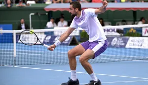 Croatia's Marin Cilic hits a return to USA's Learner Tien during their men's singles match at the Kooyong Classic tennis tournament in Melbourne on January 14, 2026. (Photo by William WEST/AFP)/-- IMAGE RESTRICTED TO EDITORIAL USE - STRICTLY NO COMMERCIAL USE --