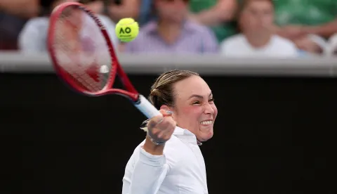 Croatia's Donna Vekic hits a return to Russia's Mirra Andreeva during their women's singles match on day two of the Australian Open tennis tournament in Melbourne on January 19, 2026. (Photo by Martin KEEP/AFP)/-- IMAGE RESTRICTED TO EDITORIAL USE - STRICTLY NO COMMERCIAL USE --