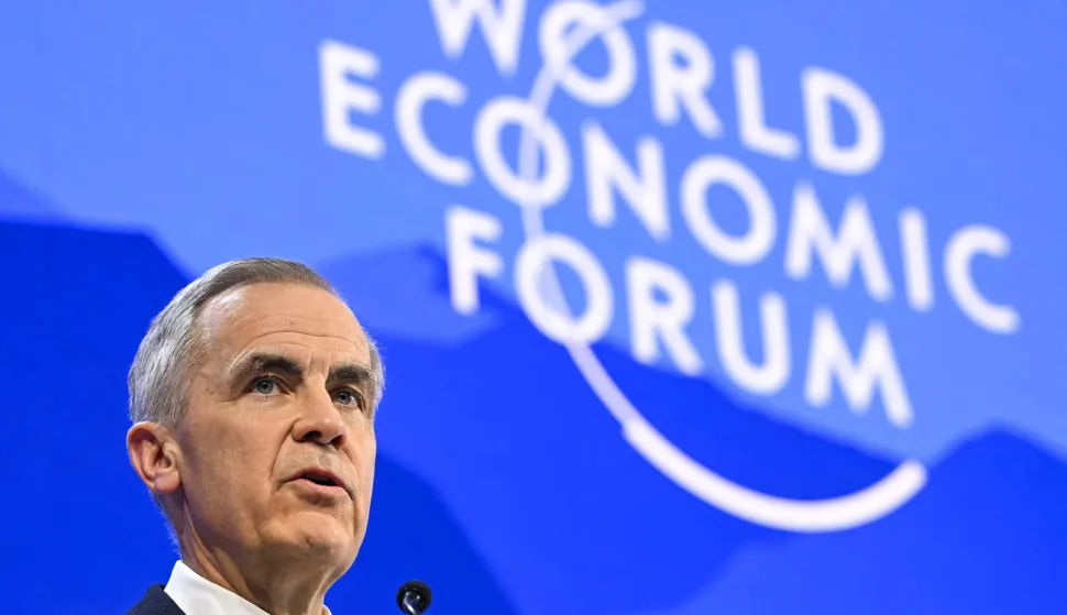 Canada's Prime Minister Mark Carney delivers a speech during the World Economic Forum (WEF) annual meeting in Davos on January 20, 2026. The World Economic Forum takes place in Davos from January 19 to January 23, 2026. (Photo by Fabrice COFFRINI/AFP)