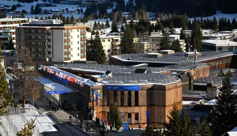 This photograph taken on January 20, 2026 shows a general view of the town of Davos, with the congress center (seen foreground) during the World Economic Forum (WEF) annual meeting in Davos. The World Economic Forum takes place in Davos from January 19 to January 23, 2026. (Photo by INA FASSBENDER/AFP)