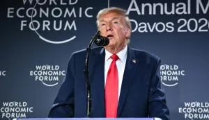 US President Donald Trump speaks during a reception with business leaders on the sidelines of the World Economic Forum (WEF) annual meeting in Davos on January 21, 2026. The World Economic Forum takes place in Davos from January 19 to January 23, 2026. (Photo by Mandel NGAN/AFP)