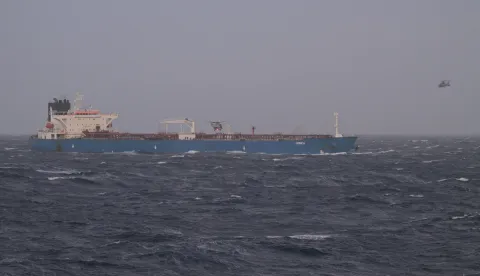 This handout photograph released by the French Defense Staff on January 22, 2026, shows a view of an oil tanker and helicopters and the Mediterranean Sea. The French Navy boarded ?an oil tanker from Russia? in the Mediterranean Sea, suspected of belonging to the ?ghost fleet? financing ?the war of aggression against Ukraine,? French President announced on January 22, 2026. (Photo by Handout/Etat Major des Arm?es/AFP)/RESTRICTED TO EDITORIAL USE - MANDATORY CREDIT "AFP PHOTO/FRENCH DEFENSE STAFF" - HANDOUT - NO MARKETING NO ADVERTISING CAMPAIGNS - DISTRIBUTED AS A SERVICE TO CLIENTS