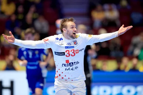 Croatia's centre back #33 Luka Cindric reacts during the men's EHF Euro 2026 main round handball match Iceland v Croatia in Malmoe, Sweden, on January 23, 2026. (Photo by Andreas Hillergren/TT/various sources/AFP)/Sweden OUT