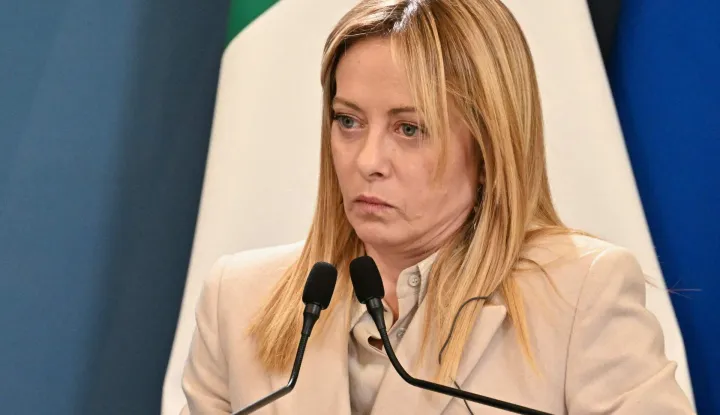 Italy's Prime Minister Giorgia Meloni attends a press conference aith Germany's Chancellor (unseen) after attending an Intergovernmental summit between Italy and Germany, at Villa Doria Pamphilj in Rome on January 23, 2026. (Photo by Andreas SOLARO/AFP)