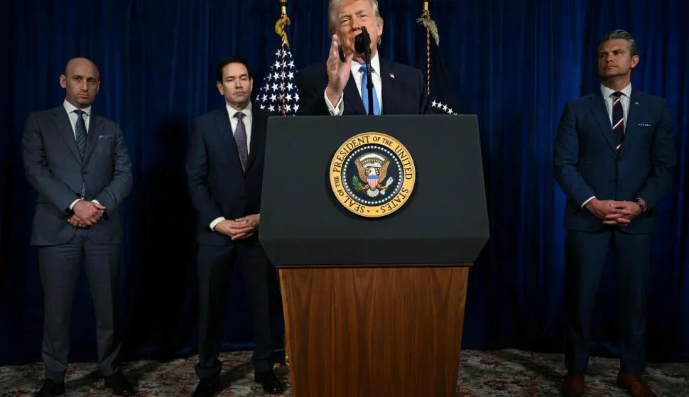 US President Donald Trump, alongside (L/R) Deputy Chief of Staff Stephen Miller, Secretary of State Marco Rubio, and US Secretary of Defense Pete Hegseth, speaks to the press following US military actions in Venezuela, at his Mar-a-Lago residence in Palm Beach, Florida, on January 3, 2026. President Trump said Saturday that US forces had captured Venezuelan leader Nicolas Maduro after launching a "large scale strike" on the South American country. (Photo by Jim WATSON/AFP)