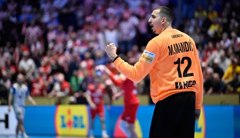 Croatia's goalkeeper #12 Matej Mandic reacts during the men's EHF Euro 2026 main round handball match Slovenia v Croatia in Malmoe, Sweden, on January 27, 2026. (Photo by Johan Nilsson/TT/TT News Agency/AFP)/Sweden OUT
