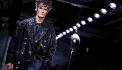 A model presents a creation by Yohji Yamamoto for the Menswear Ready-to-wear Fall-Winter 2026/2027 collection as part of the Men Paris Fashion Week in Paris on January 22, 2026. (Photo by Ian LANGSDON/AFP)