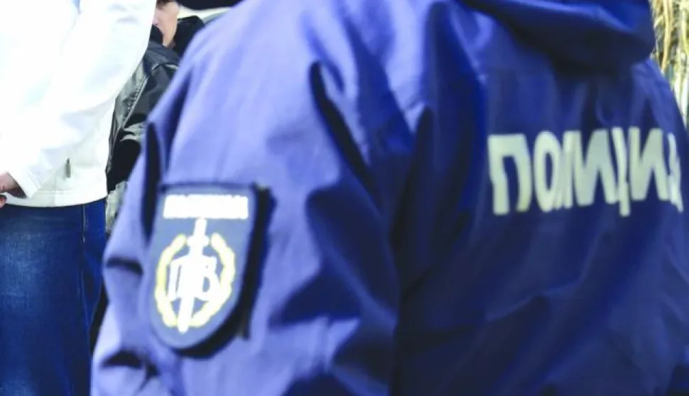 14.03.2016., Beograd, Srbija - Na Visem sudu, saslusavanjem svjedoka nastavljen je postupak pravne rehabilitacije Milana Nedica, predsjednika pronacisticke Vlade Srbije za vrijeme okupacije u Drugom svjetskom ratu. Pod nadzorom policije pristase i protivnici rehabilitacije Nedica skandiraju i razmjenjuju uvrede. Photo: Srdjan Ilic/PIXSELL------1 stupac colornovosti