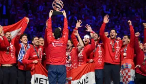 Croatia's players celebrate with the trophy during the awarding ceremony after the team won bronze in the Men's EHF Euro 2026 finals in Herning, Denmark, on February 1, 2026. (Photo by Jonathan Nackstrand/AFP)