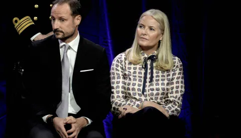 (FILES) Norway's Crown Prince Haakon and Crown Princess Mette-Marit attend the Save the Children peace prize party at the Nobel Peace Center ahead of the Nobel Peace Prize award ceremony at the Oslo City Hall in Oslo, Norway on December 10, 2024. Norwegian Crown Princess Mette-Marit's life was once the stuff of fairytales, but rape charges against her son and her recently revealed friendship with convicted US sex offender Jeffrey Epstein have seen it rapidly turn into a nightmare. The tale of the single mother from humble beginnings, whose chance encounter with Crown Prince Haakon propelled her to the heart of the monarchy, won the affection of Norwegians. But her frequent exchanges with Epstein, published this weekend in Norwegian media, have exposed an unsuspected relationship that has shocked the Scandinavian country. (Photo by Stian Lysberg Solum/NTB/AFP)/Norway OUT