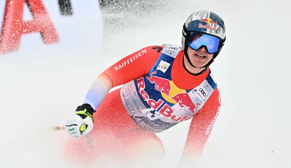 Switzerland's Franjo Von Allmen reacts in the finish area during the Men's Downhill event of the FIS Alpine Skiing World Cup in Kitzbuhel, Austria, on January 24, 2026. (Photo by Joe Klamar/AFP)