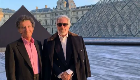 (FILES) A screengrab taken on February 3, 2026 from a video released in files related to the investigation into the late convicted sex offender Jeffrey Epstein, published by the US Department of Justice, shows Jack Lang, a French former culture minister posing with Jeffrey Epstein at the Louvre pyramid in Paris. Former French Culture Minister Jack Lang 'offers' resignation from the Arab World Institute (Institut du Monde Arabe de Paris - IMA) over Epstein links, according to a letter seen by AFP. (Photo by US DEPARTMENT OF JUSTICE/AFP)/RESTRICTED TO EDITORIAL USE - MANDATORY CREDIT "AFP PHOTO/DEPARTMENT OF JUSTICE/HO" - HANDOUT - NO MARKETING NO ADVERTISING CAMPAIGNS - DISTRIBUTED AS A SERVICE TO CLIENTS