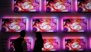 GERMANY-BERLIN-CONSUMER ELECTRONICS FAIR (190906) -- BERLIN, Sept. 6, 2019 (Xinhua) -- A visitor talks with a staff member at the booth of Philips during the 2019 IFA fair in Berlin, capital of Germany, on Sept. 6, 2019. The 59th Consumer Electronics Unlimited (IFA) fair, Europe's biggest consumer electronics show, opened in Berlin on Friday, with the latest products and innovations from the leading global brands. (Xinhua/Shan Yuqi) Shan Yuqi Photo: XINHUA/PIXSELL