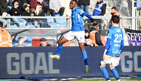 KRC Genk's Nigerian forward #14 Yira Sor celebrates after scoring a goal during the Belgian "Pro League" First Division football match between KRC Genk and RSC Anderlecht at the Cegeka Arena in Genk on February 8, 2026. (Photo by JILL DELSAUX/BELGA/AFP)/Belgium OUT