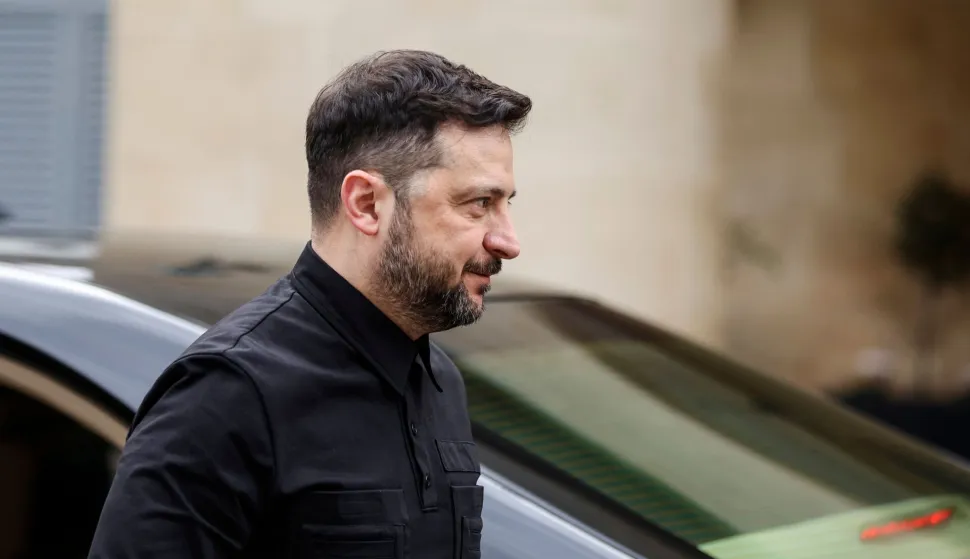 Ukraine's President Volodymyr Zelensky arrives for a meeting with his Cypriot counterpart at the presidential palace in Nicosia on January 7, 2026. (Photo by ALEX MITA/AFP)