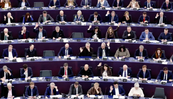 Members of the European Parliament take part in a voting session during a plenary session at the European Parliament in Strasbourg, eastern France, on January 21, 2026. (Photo by FREDERICK FLORIN/AFP)