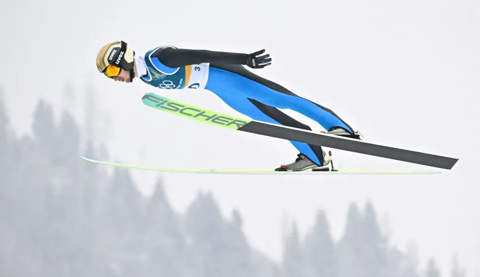 CORRECTION/Finland's Ilkka Herola jumps during the ski jumping trial round of the nordic combined individual Gundersen normal hill/10km event at Predazzo Ski Jumping Stadium in Predazzo (Val di Fiemme) during the Milano Cortina 2026 Winter Olympic Games on February 11, 2026. (Photo by Tobias SCHWARZ/AFP)/?The erroneous mention[s] appearing in the metadata of this photo by Tobias SCHWARZ has been modified in AFP systems in the following manner: [Finland's Ilkka Herola] instead of [Germany's Johannes Rydzek]. Please immediately remove the erroneous mention[s] from all your online services and delete it (them) from your servers. If you have been authorized by AFP to distribute it (them) to third parties, please ensure that the same actions are carried out by them. Failure to promptly comply with these instructions will entail liability on your part for any continued or post notification usage. Therefore we thank you very much for all your attention and prompt action. We are sorry for the inconvenience this notification may cause and remain at your disposal for any further information you may require.?
