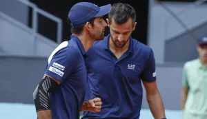 epa12071285 Marcelo Arevalo (L) of El Salvador and Mate Pavic of Croatia talk as they play against Horacio Zeballos of Argentine and Marcel Granollers of Spain during the men's doubles final at the Mutua Madrid Open, in Madrid, Spain, 03 May 2025. EPA/Chema Moya