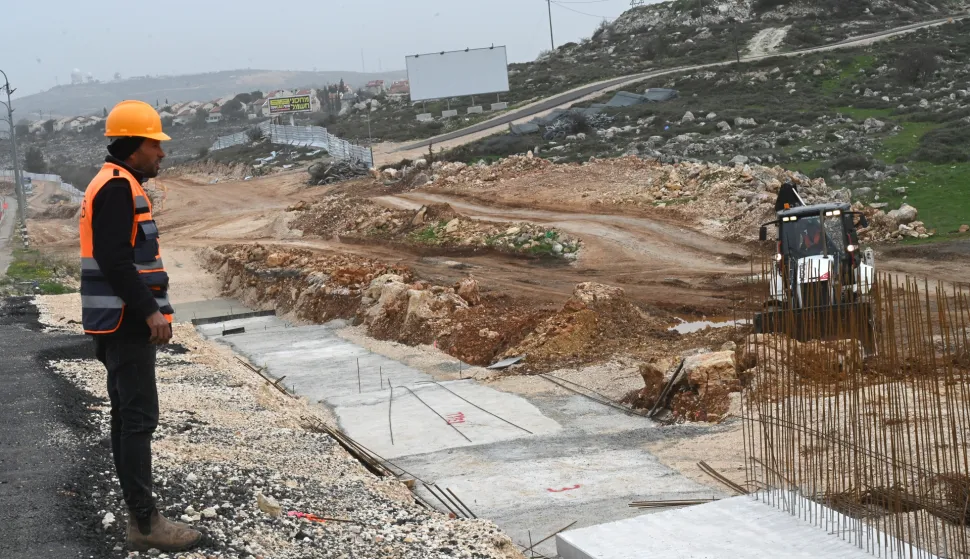 Workers build a new Israeli highway for Jewish settlements near the Ofra settlement, in the West Bank on Monday, February 9, 2026. The Israeli Security Cabinet approved measures to expand Israel's control of the West Bank by removing land sale restrictions, increasing enforcement in Areas A and B and renewing state-led land acquisition in the Palestinian territories. Senior ministers said the move would strengthen Israel's administrative and legal control over the West Bank. Photo by Debbie Hill/UPI Photo via Newscom Photo: DEBBIE HILL/NEWSCOM