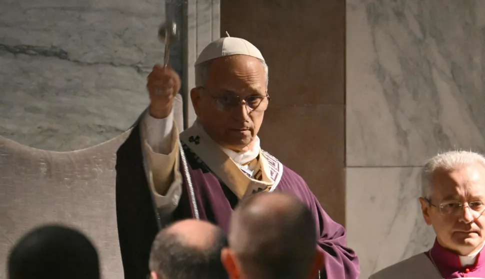 Pope Leo XIV leads the celebration of Ash Wednesday at the Church of Saint Sabina in Rome on February 18, 2026. (Photo by Alberto PIZZOLI/AFP)