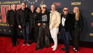 HOLLYWOOD, CALIFORNIA - FEBRUARY 18: (L-R) Jonathan Redmond, Tom Mackay, Colin Smeeton, Jeremy Castro, Baz Luhrmann, Tom Quinn, CEO, NEON, Matthew Gross and Krista Wegener attend the Los Angeles Premiere of Baz Luhrmann's "EPiC: Elvis Presley In Concert" Presented by Neon at TCL Chinese Theatre on February 18, 2026 in Hollywood, California. Kevin Winter/Getty Images/AFP (Photo by KEVIN WINTER/GETTY IMAGES NORTH AMERICA/Getty Images via AFP)