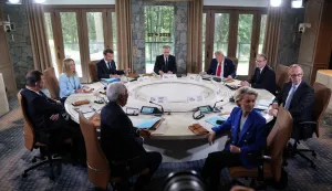 epa12179446 (L-R, clockwise) Japan's Prime Minister Shigeru Ishiba, Italy's Prime Minister Giorgia Meloni, French President Emmanuel Macron, Canadian Prime Minister Mark Carney, US President Donald Trump, British Prime Minister Keir Starmer, German Chancellor Friedrich Merz, European Commission President Ursula Von der Leyen, and European Council President Antonio Costa attend a working session at the Group of Seven (G7) Summit at the Pomeroy Kananaskis Mountain Lodge, in Kananaskis, Alberta, Canada, 16 June 2025. EPA/LUDOVIC MARIN/POOL