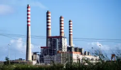 (FILES) View of the refinery El Palito in Puerto Cabello, Carabobo state, Venezuela on January 11, 2026. Venezuela's interim president Delcy Rodriguez forecast a .4 billion bonanza from planned reforms to the oil sector aimed at drawing in foreign investors following the ouster of Nicolas Maduro. During a meeting with business leaders attended by AFP on January 26, 2026, Rodriguez projected investments in the oil sector would rise 55 percent over 2025, when they totaled 0 million. (Photo by Maryorin Mendez/AFP)