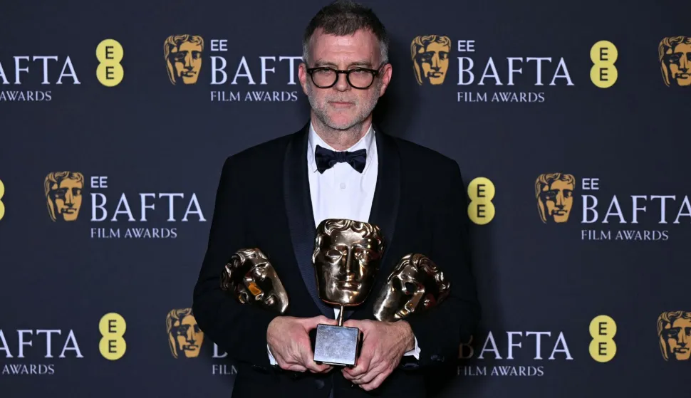 US film director Paul Thomas Anderson poses with the award for Best film for "One Battle After Another" during the BAFTA British Academy Film Awards ceremony at the Royal Festival Hall, Southbank Centre, in London, on February 22, 2026. (Photo by JUSTIN TALLIS/AFP)