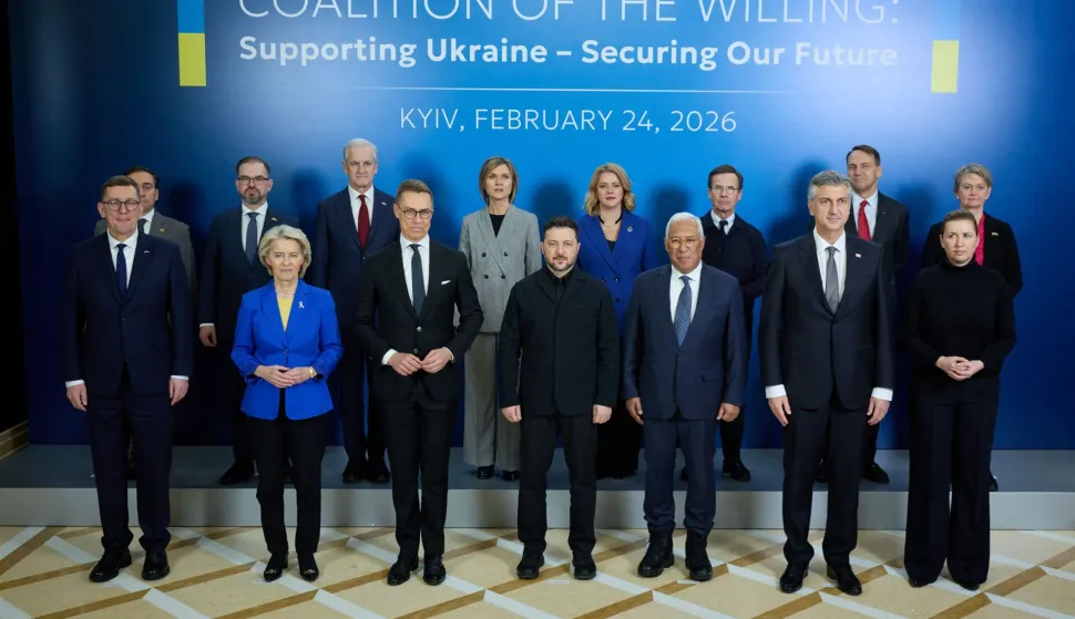 In this handout photograph taken and released by the Ukrainian Presidential Press Service on February 24, 2026, (L-R, 1st row) Estonia's Prime Minister Kristen Michal, European Commission President Ursula von der Leyen, Finland's President Alexander Stubb, Ukraine's President Volodymyr Zelensky, European Council President Antonio Costa, Croatia's Prime Minister Andrej Plenkovic, Denmark's Prime Minister Mette Frederiksen and (2nd row) Norway's Prime Minister Jonas Gahr Store (3rd L), Lithuania's Defence Minister Robertas Kaunas (4th L), Latvia's Prime Minister Evika Silina 4th R), Sweden's Prime Minister Ulf Kristersson (3rd R) and Poland's Foreign Minister Radoslaw Sikorski (2nd R) pose for a photo prior to a meeting of Coalition of the Willing in Kyiv, as Ukraine marks the fourth anniversary of Russia's invasion. (Photo by Handout/UKRAINIAN PRESIDENTIAL PRESS SERVICE/AFP)/RESTRICTED TO EDITORIAL USE - MANDATORY CREDIT "AFP PHOTO/UKRAINIAN PRESIDENTIAL PRESS SERVICE" - NO MARKETING NO ADVERTISING CAMPAIGNS - DISTRIBUTED AS A SERVICE TO CLIENTS