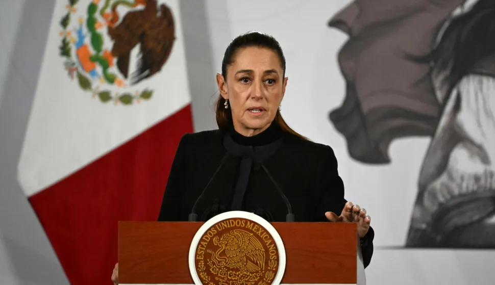 Mexico's President Claudia Sheinbaum speaks during her daily press conference at Palacio Nacional in Mexico City on February 23, 2026. Mexico was on high alert on February 23 with schools closed and travelers stranded, as members of a powerful drug cartel went on a violent rampage across parts of the country after the army announced it had killed its leader. (Photo by YURI CORTEZ/AFP)