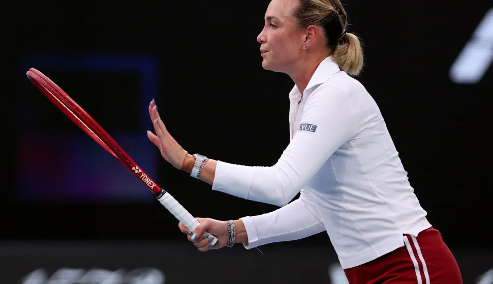 Croatia's Donna Vekic reacts on a point to Russia's Mirra Andreeva during their women's singles match on day two of the Australian Open tennis tournament in Melbourne on January 19, 2026. (Photo by Martin KEEP/AFP)/-- IMAGE RESTRICTED TO EDITORIAL USE - STRICTLY NO COMMERCIAL USE --