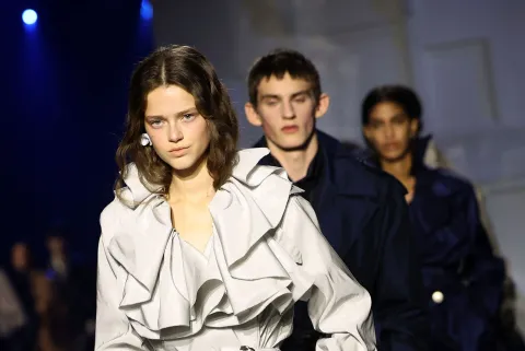 Models present creations during a catwalk presentation for Burberry's Autumn/Winter 2026 collection, during London Fashion Week in London on February 23, 2026. (Photo by Toby Shepheard/AFP)
