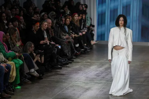 A model presents a creation from the Autumn-Winter 2026-2027 collection 'The Sovereignty Of Stillness' from Britain-based womenswear designer Naomi Hart at London Fashion Week at Fashion Scout, in London on February 22, 2026. (Photo by Toby Shepheard/AFP)