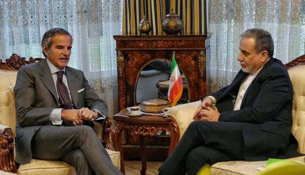 In this handout photo released by the Iranian Ministry of Foreign Affairs, Iran's Foreign Minister Abbas Araghchi (R) holds a meeting with International Atomic Energy Agency head Rafael Grossi in Geneva on February 16, 2026. Iran's foreign minister has arrived in Geneva ahead of a second round of negotiations with the US, Iranian state television said February 16, as Washington keeps up pressure on the Islamic republic. (Photo by Iranian Ministry of Foreign Affairs/AFP)/XGTY/RESTRICTED TO EDITORIAL USE - MANDATORY CREDIT "AFP PHOTO/Iranian Ministry of Foreign Affairs" - NO MARKETING NO ADVERTISING CAMPAIGNS - DISTRIBUTED AS A SERVICE TO CLIENTS