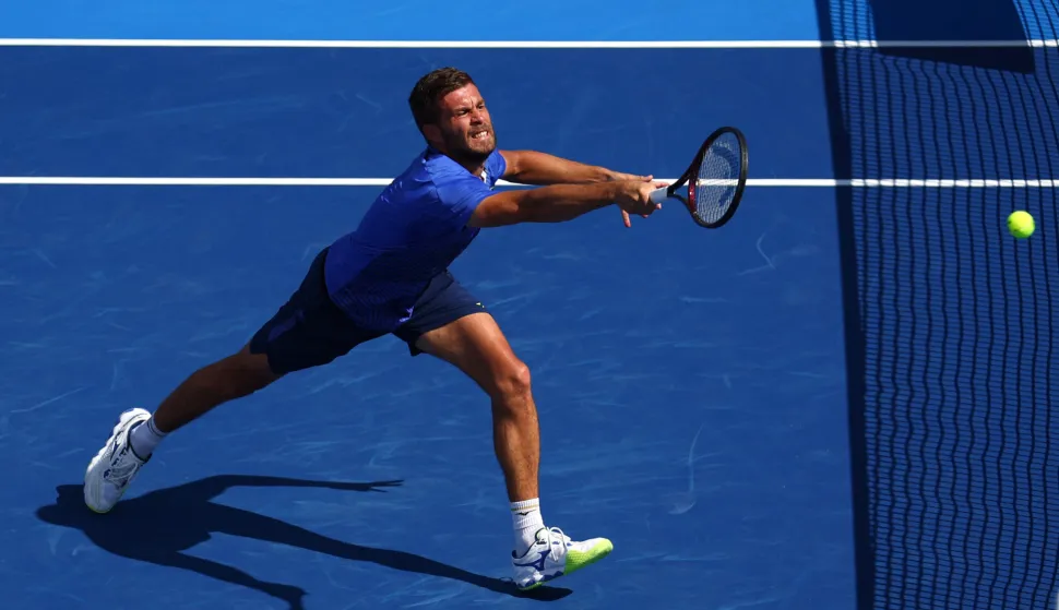DELRAY BEACH, FLORIDA - FEBRUARY 22: Nikola Mektic of Croatia returns a shot against Benjamin Kittay and Ryan Seggerman of the United States during their Men's Doubles Final match at Delray Beach Tennis Center on February 22, 2026 in Delray Beach, Florida. Megan Briggs/Getty Images/AFP (Photo by Megan Briggs/GETTY IMAGES NORTH AMERICA/Getty Images via AFP)