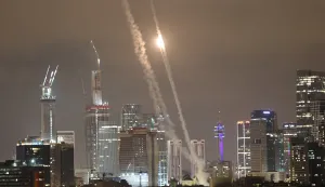 epa12176271 Israel's Iron Dome air defense system intercepts ballistic missiles fired from Iran over the city of Tel Aviv, Israel, 15 June 2025. Israel's military identified the missiles as being launched from Iran toward Israeli territory in retaliation for overnight airstrikes on Iranian targets. EPA/ATEF SAFADI