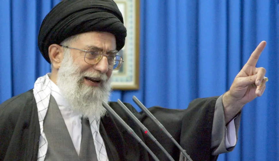 (FILES) Iran's supreme leader Ayatollah Ali Khamenei gives a Friday prayer sermon at Tehran University 11 April 2003. Witnesses said on February 28, 2026, that loud cheers echoed across parts of Tehran and residents took to their windows to applaud and play celebratory music after reports of Iranian supreme leader Ayatollah Ali Khamenei's death. (Photo by Atta KENARE/AFP)