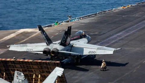 This US Navy photo released by US Central Command public affairs shows a F/A-18E Super Hornet, attached to Strike Fighter Squadron (VFA) 14, launching from the flight deck of Nimitz-class aircraft carrier USS Abraham Lincoln (CVN 72) in support of Operation Epic Fury, from an undisclosed location on February 28, 2026. The United States and Israel launched a wave of strikes against targets in Iran on February 28, sparking swift retaliation by the Islamic republic which responded with missile attacks across the region. (Photo by US Central Command (CENTCOM)/AFP)/RESTRICTED TO EDITORIAL USE - MANDATORY CREDIT "AFP PHOTO/US CENTCOM/US NAVY" - HANDOUT - NO MARKETING NO ADVERTISING CAMPAIGNS - DISTRIBUTED AS A SERVICE TO CLIENTS