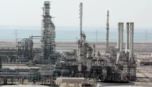 (FILES) A general view shows Ras Tannura's oil production plant near Dammam in Saudi Arabia's eastern province, 27 December 2004. Saudi oil refinery, Ras Tanura, along the Gulf coast was targeted in an attack on March 2, 2026, a source familiar with the incident told AFP, as Iran launched a fresh barrage at countries across the region. (Photo by BILAL QABALAN/AFP)