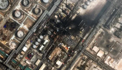 This handout satellite image courtesy of Vantor taken and released on March 2, 2026, shows damage at the Saudi Aramco's Ras Tanura refinery. Saudi Arabia's military raised its readiness levels after multiple attacks by Iran, a source close to the army told AFP on March 2, while another warned of a possible military response if its oil infrastructure is targeted. The massive Ras Tanura refinery on Saudi Arabia's Gulf coast went into partial shutdown on March 2 after a strike by drones, three days into the Middle East war. (Photo by Satellite image ?2026 Vantor/AFP)/RESTRICTED TO EDITORIAL USE - MANDATORY CREDIT "AFP PHOTO/SATELLITE IMAGE ?2026 Vantor" - HANDOUT - NO MARKETING NO ADVERTISING CAMPAIGNS - DISTRIBUTED AS A SERVICE TO CLIENTS - THE WATERMARK MAY NOT BE REMOVED/CROPPED