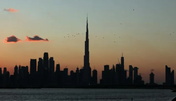 epa09018030 (FILE) - The sun sets behind the skyline during sunset in Dubai, United Arab Emirates, 12 January 2020 (reissued 17 February 2021). The daughter of Dubai's ruler, Princess Latifa, has appeared in what seems to be a secretly recorded video, claiming that she is being detained in Dubai by her father. The video was obtained by the Free Latifa campaign, run by her friend Tiina Jauhiainen. EPA/ALI HAIDER *** Local Caption *** 55762869