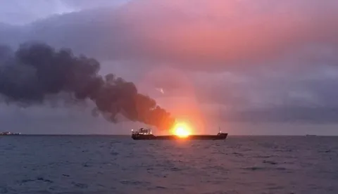 epa07307226 One of the two gas tanker vessels burns in the Kerch Strait between the Crimean and Russian borders in the Black Sea, 21 January 2019. According to reports, at least ten crew members were found dead after a fire aboard the LNG-carrying cargo ships Maestro and Candy sailing under Tanzanian flag broke out. EPA/KERCH.FM BEST QUALITY AVAILABLE